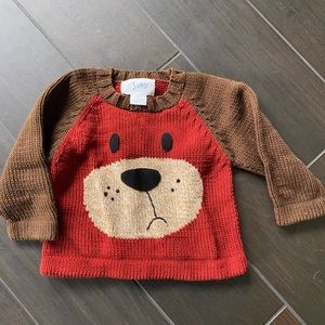 Super sweet red and brown puppy sweater, nice stitched detail.
